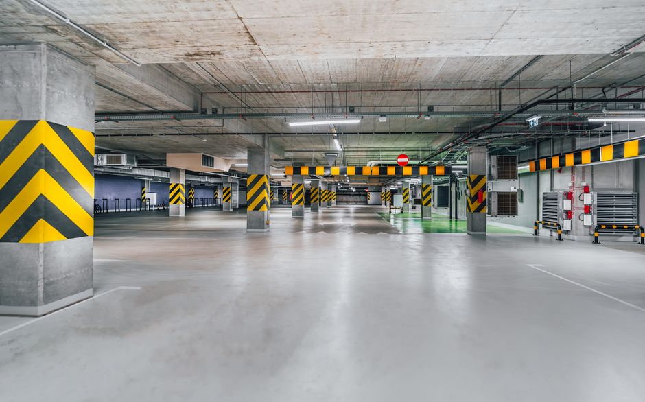 Cement-Based Repair Products vs. Epoxy Garage Floor Coatings: When to Patch and When to Coat the Whole Slab